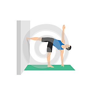 Man doing Parivrtta Ardha Chandrasana. Revolved Half Moon Pose