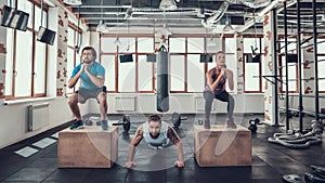 Man Doing Push Ups. Guy And Girl Doing Squats