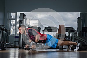 Man doing push-ups in the gym