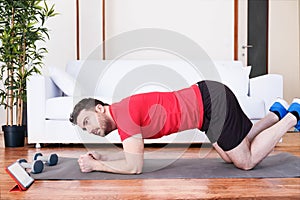 Man doing push ups at home