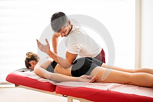 Man doing a quadratus lumborum muscle treatment