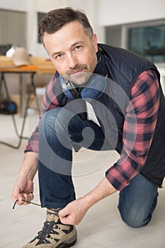 man doing shoe laces