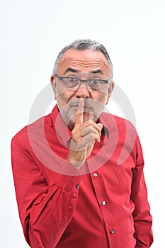 Man doing in silent silence with fingers