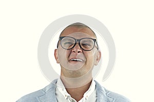 Man doing silly face with nerd glasses isolated on white