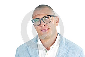 Man doing silly face with nerd glasses isolated on white