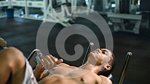 Man doing sit ups fitness exercise at sport gym