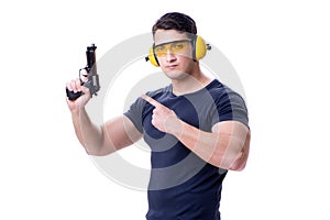 The man doing sport shooting from gun isolated on white