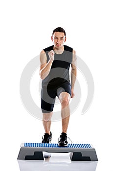 Man doing step exercise photo