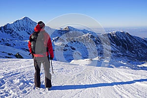 Man doing winter trekking in the mountains