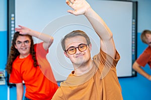 Man with down syndrome and mates in a gym