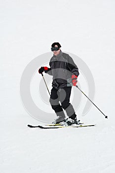 Man downhill skiing