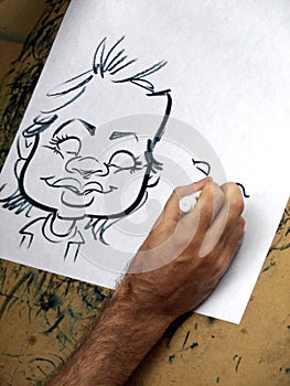 man drawing caricature