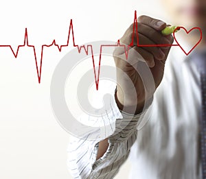 Man drawing chart heartbeat