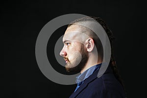 Man with dreadlocks, looks like a viking, Iroquois haircut