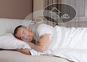 Man dreaming about new house and car