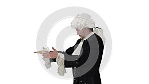 Man dressed like Wolfgang Amadeus Mozart conducting an orchestra on white background.