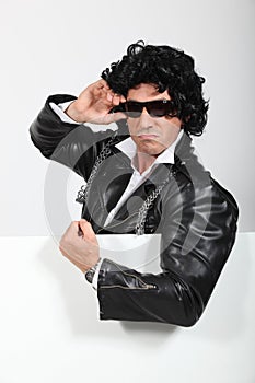 Man dressed up in a silly wig