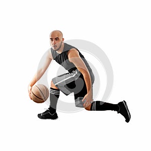 Man dribbles on white background with basketball ball