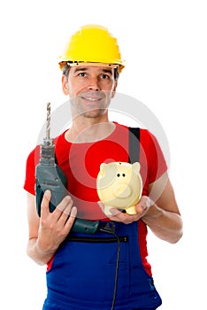 Man with drill and piggy bank photo