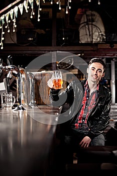 Man drinking beer in pub