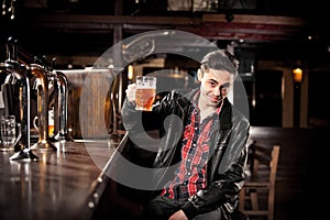 Man drinking beer in pub