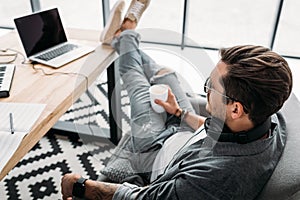 Man drinking coffee at workplace