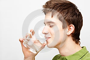 Man is drinking mineral water