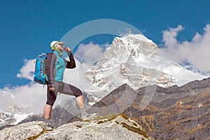 Man drinking Refreshment in high altitude Mountains