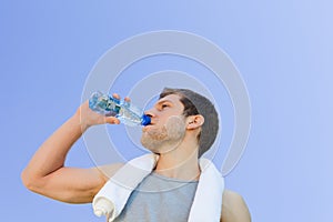 Man drinking water after the gym