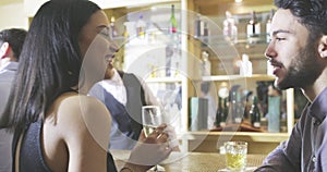 Man, drinks and date with woman at bar for alcohol, social event and happy hour. Cocktail, energy and smile with couple
