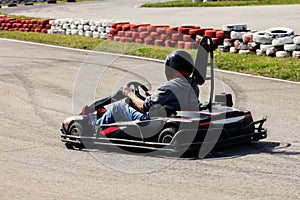 Man drive go kart on track