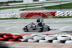 Man drive go kart on track