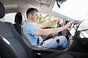 Man or driver driving car and using gps navigator