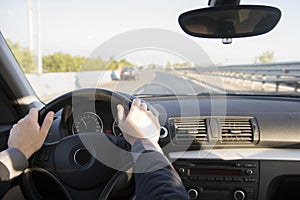Man driving car photo