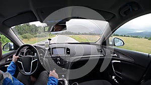 Man driving a car with gps navigation