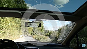 Man driving a car with gps navigation system