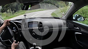 Man driving a car with gps navigation system