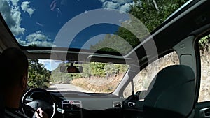 Man driving a car with gps navigation system