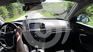 Man driving a car with gps navigation system