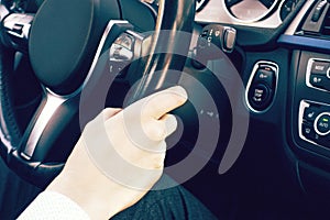 Man driving a car. men`s hands hold the steering wheel