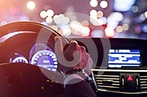 Man driving a car at night