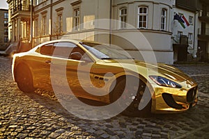 A man driving an expensive car. A man is driving, a successful man is driving a car. Golden yellow car. A man at sunset driving.