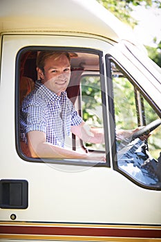 Man Driving Motor Home On Vacation