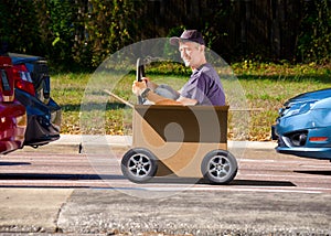 Man driving moving day box