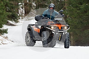 Man driving a quad bike