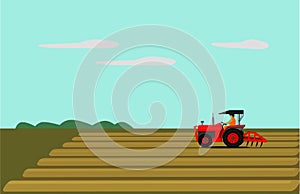 The man is driving a red tractor. In order to plow the soil in the field.