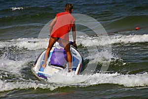 Man driving a water scooter