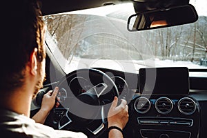 Driving on winter roads. Traveling by car, driving concept