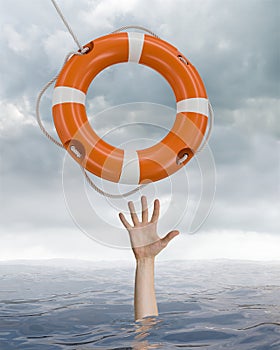 Man is drowning in ocean and is catching life buoy