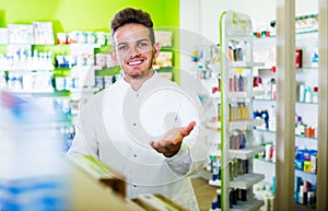 Man druggist in pharmacy